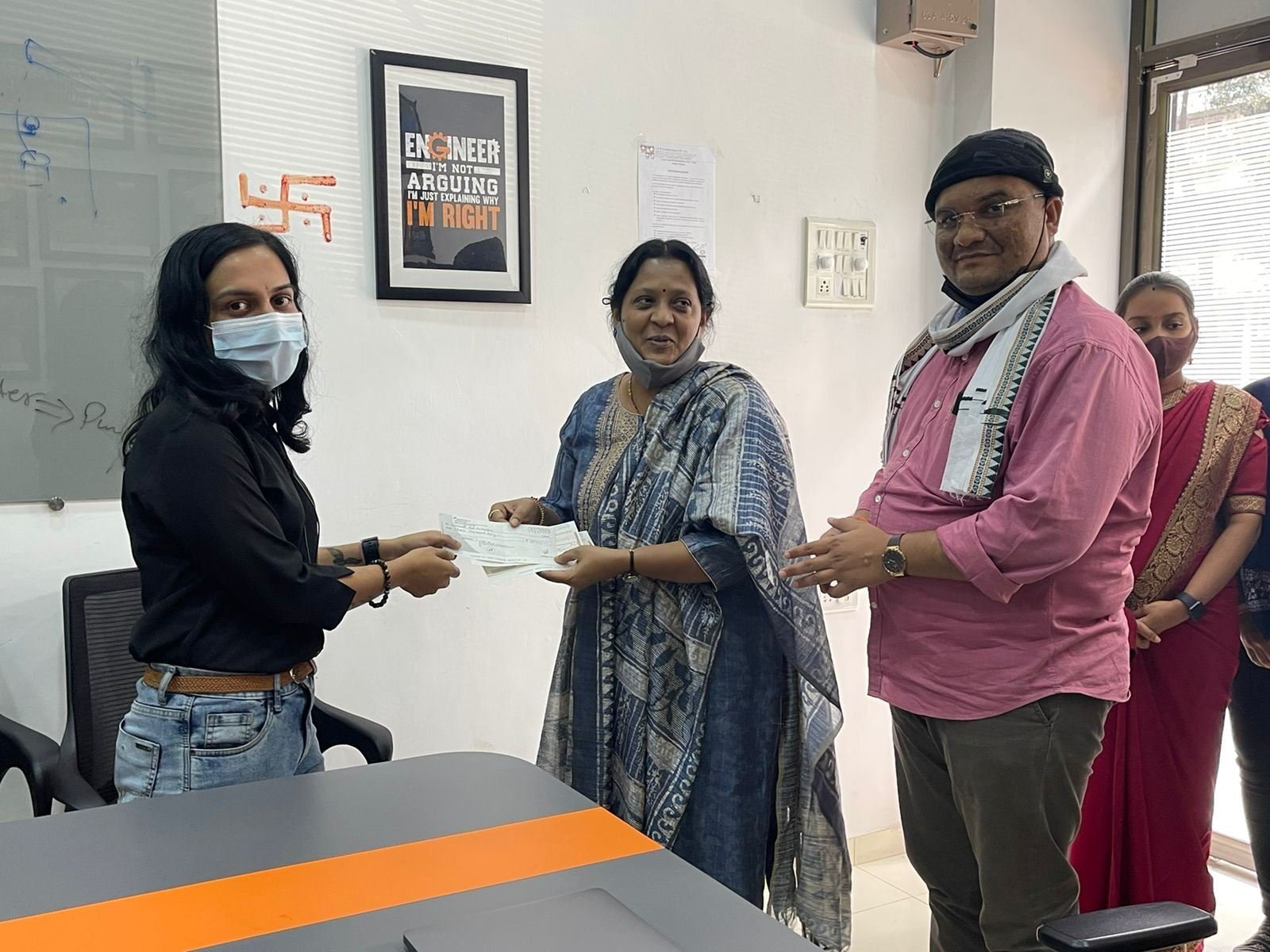 SRGPL team handing over a donation to Sanmati Balniketan