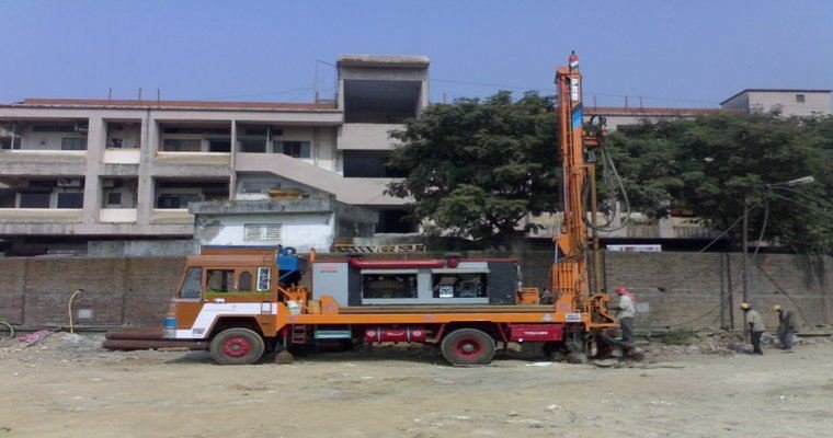 Rock anchor drilling on an excavated rock face
